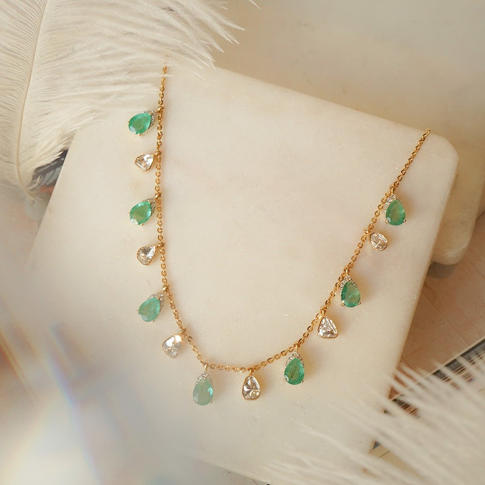 Polki necklace featuring emerald motifs and heritage-style dreams in a refined frame