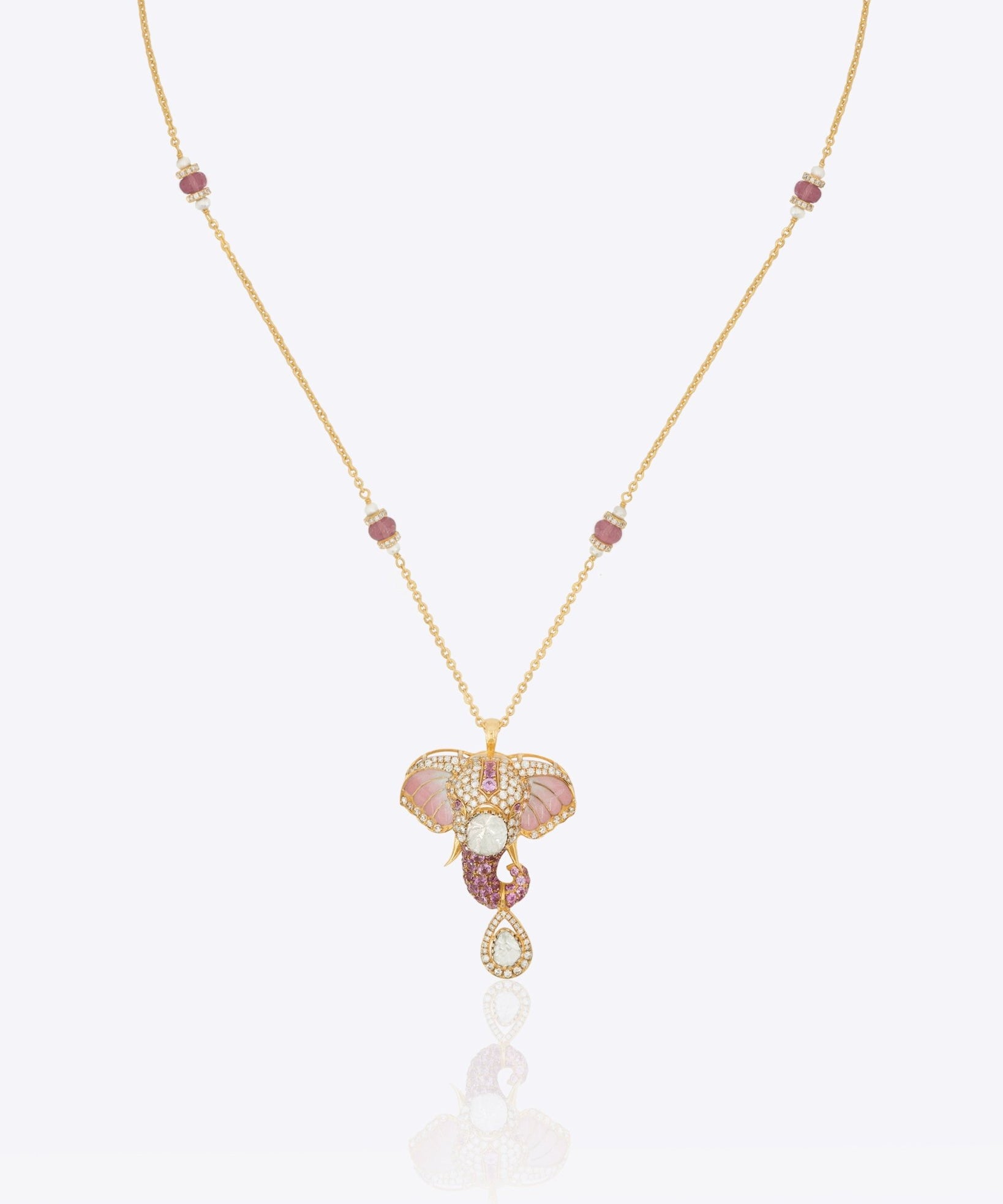 Gold necklace with a decorative pendant
