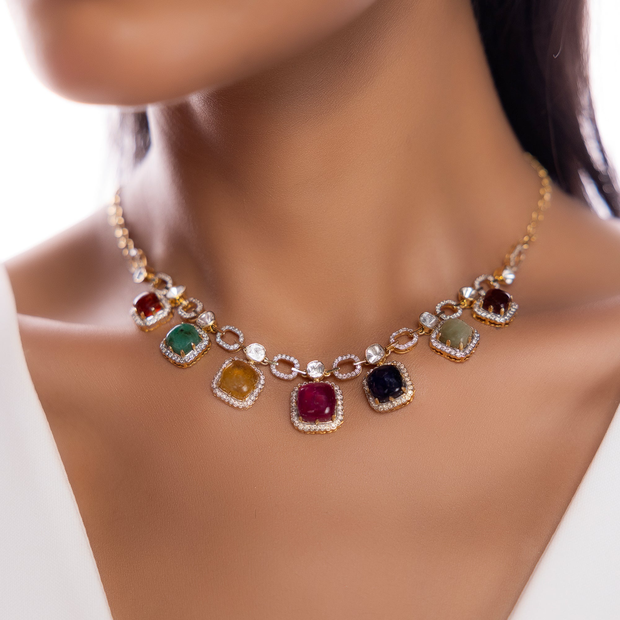 Model in Mosaic Prisms necklace with radiant spectrum of gems and diamonds