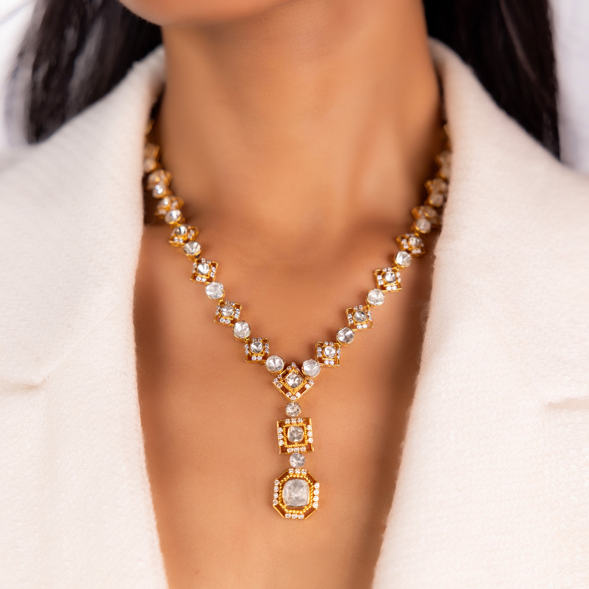 Evelyn Polki diamond necklace styled elegantly on model, showcasing timeless Indian elegance