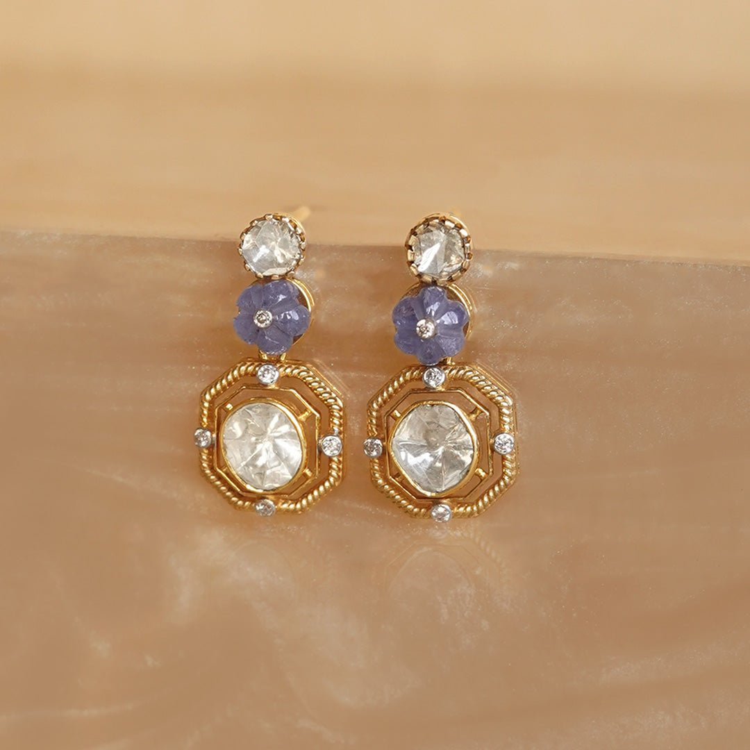 Product photo of Nerissa earrings with sapphire-polki blend in high polish gold.