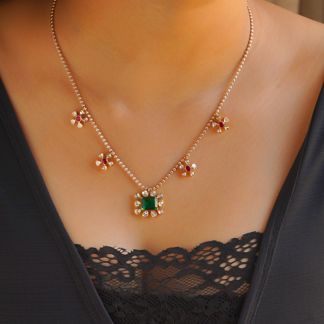 Model wearing Polki Floral necklace with uncut diamonds in floral arrangement