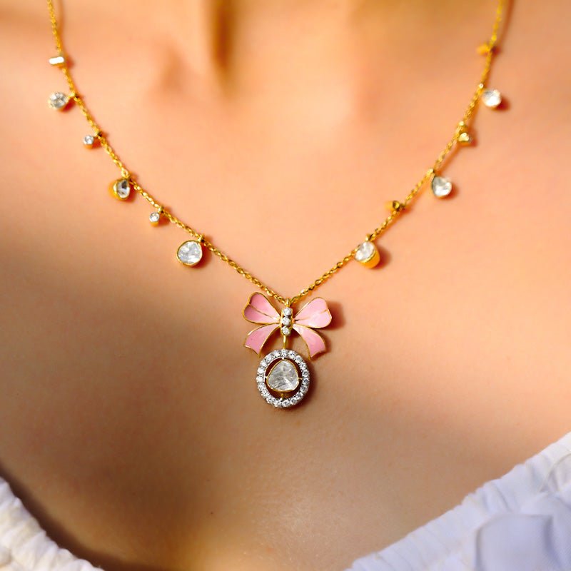 Rosé Ribbon Polki necklace elegantly worn by model, showcasing romantic pink sapphires