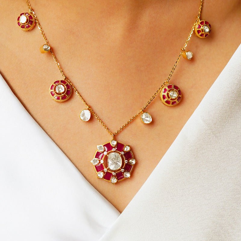 Crimson Celestia necklace styled on model, radiant ruby-polki blend for festive elegance