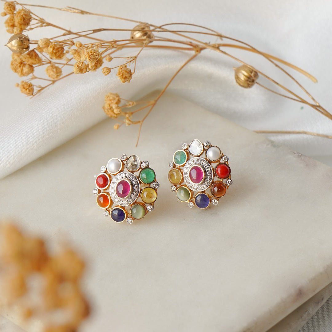 Product photo of Navratna Polki Studs with nine-gem symbolism and kundan finish.