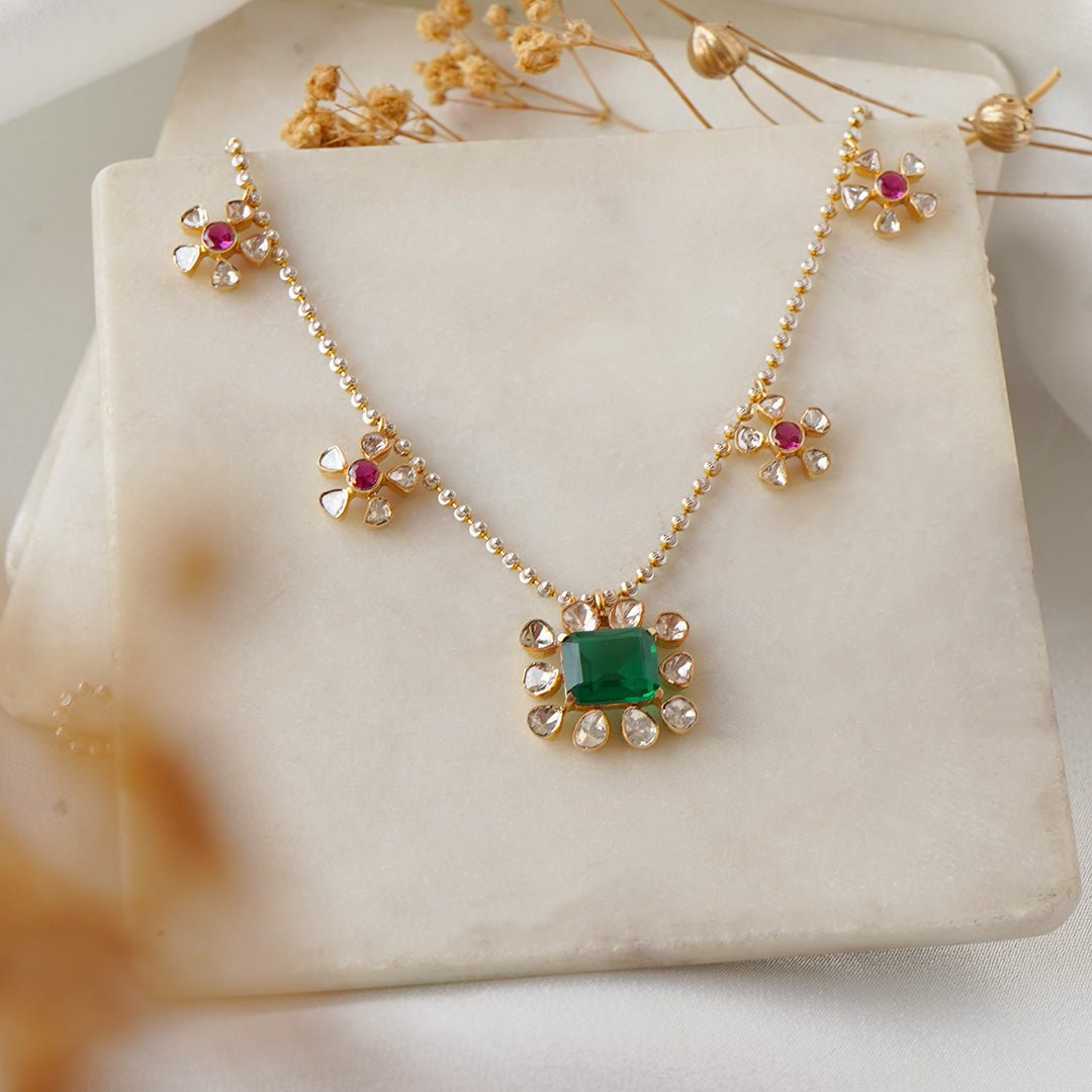 Floral Polki necklace in flat format with heritage-style blooms and sparkling accents