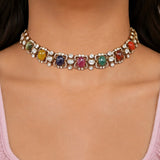 14K gold Navratna Fluttering necklace with vibrant Navratna stones and a Polki border.