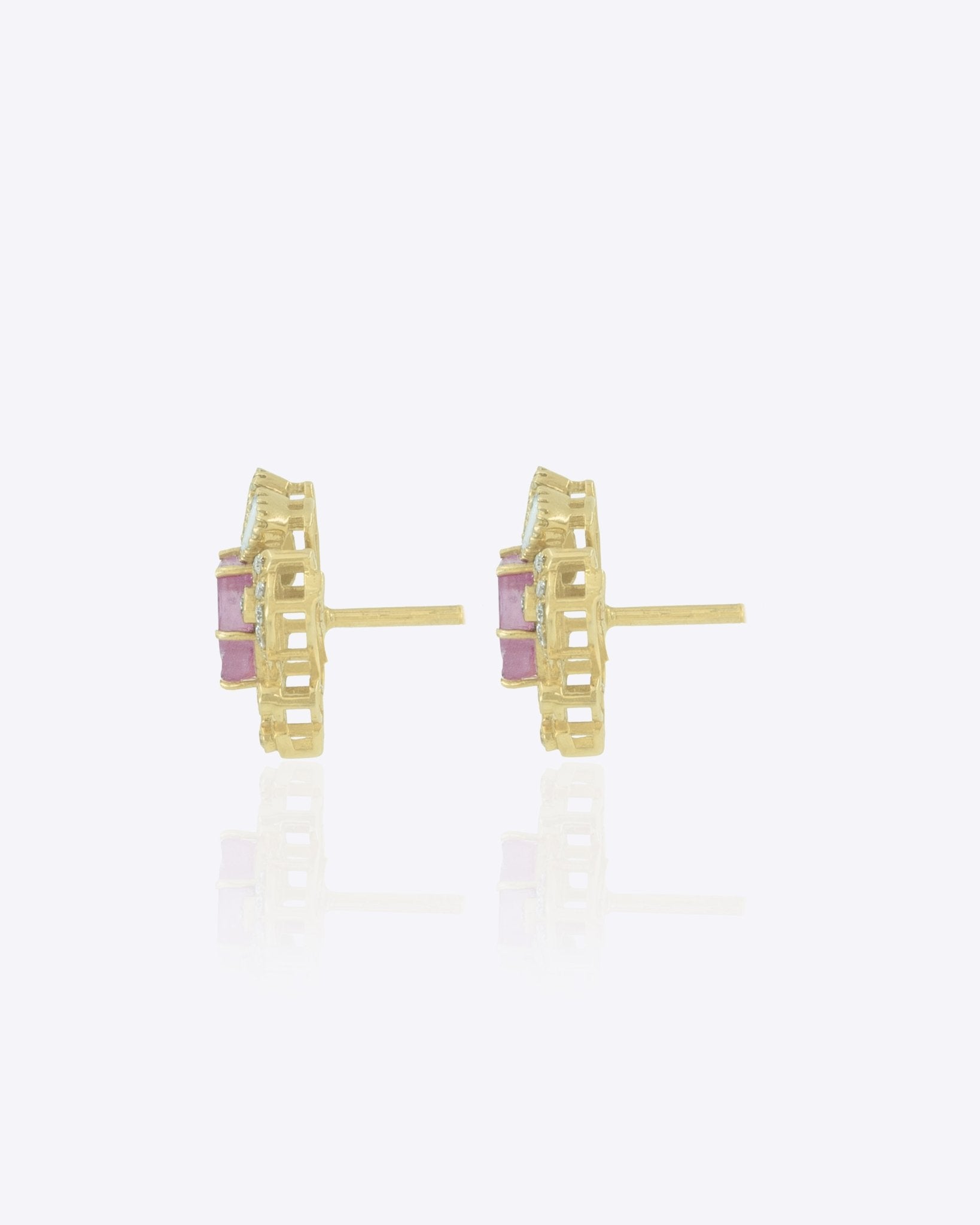 14K gold Mughal Muse earrings with Polki diamonds in a classic motif.