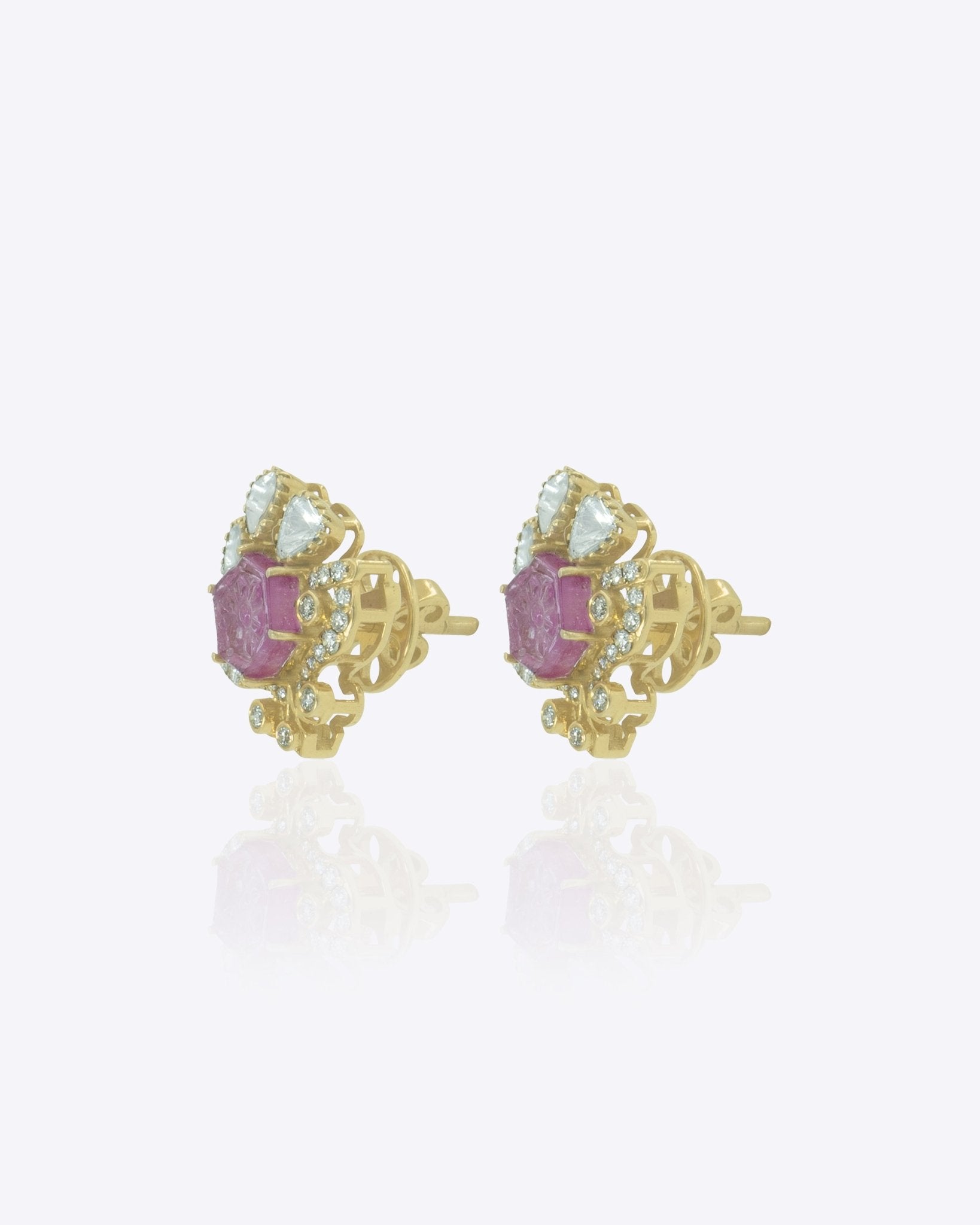 14K gold Mughal Muse earrings with Polki diamonds in a classic motif.