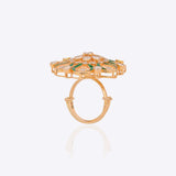 14K gold ring with a green talaf stone centerpiece and Polki diamonds.