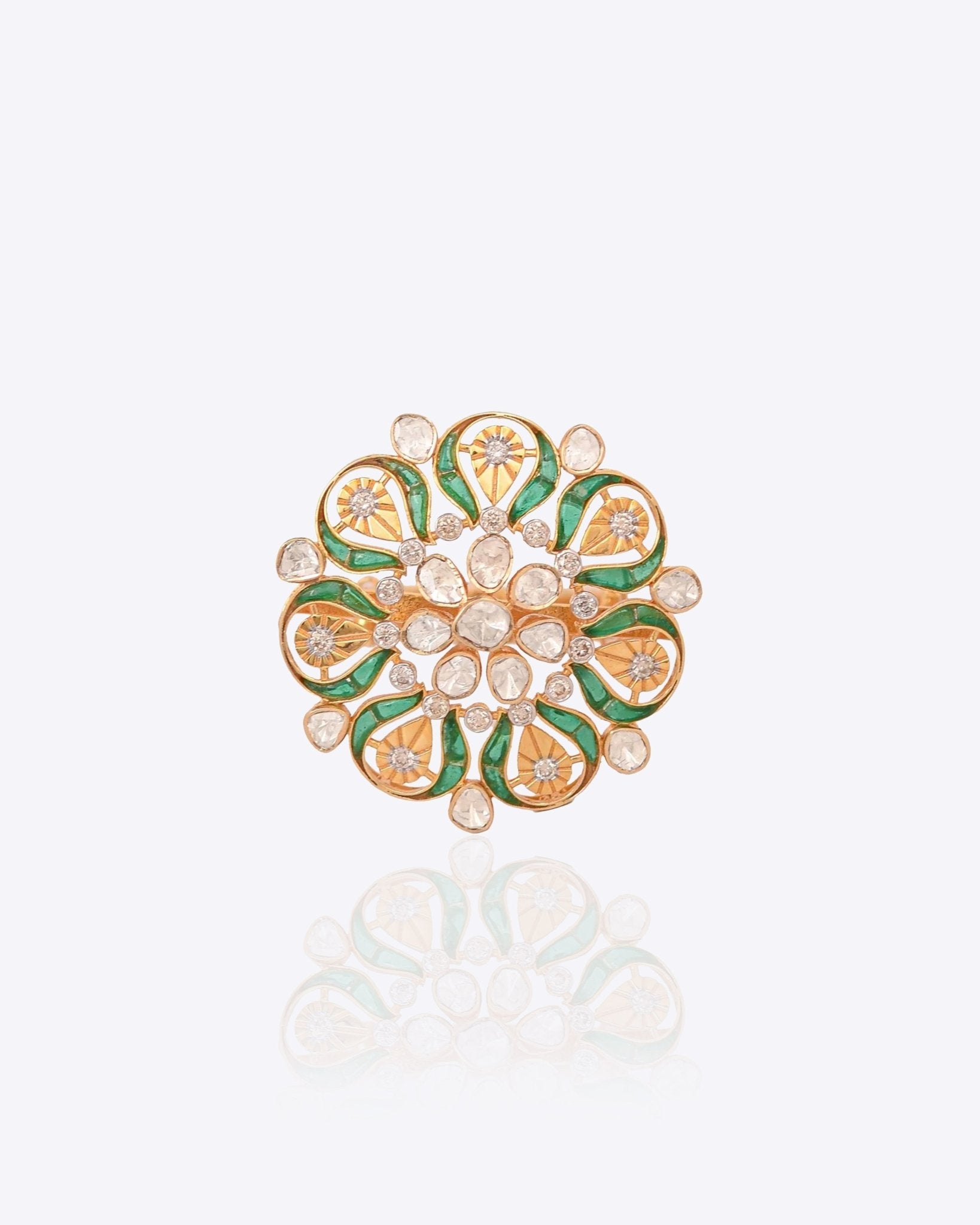 14K gold ring with a green talaf stone centerpiece and Polki diamonds.