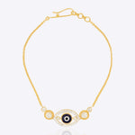 14k gold bracelet with an Evil Eye motif and diamond halo