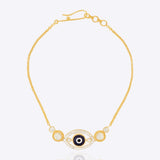 14k gold bracelet with an Evil Eye motif and diamond halo