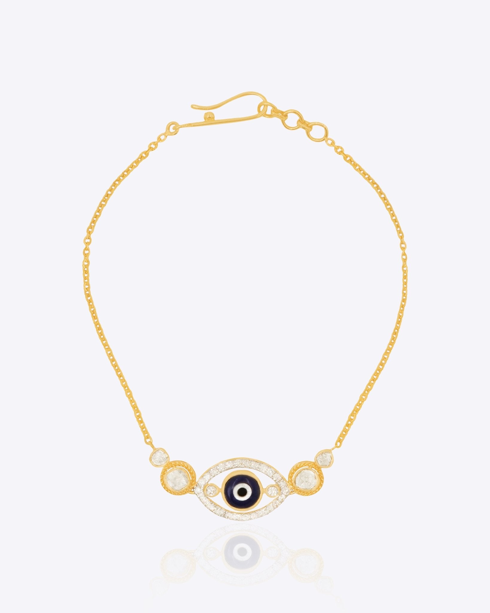 14k gold bracelet with an Evil Eye motif and diamond halo