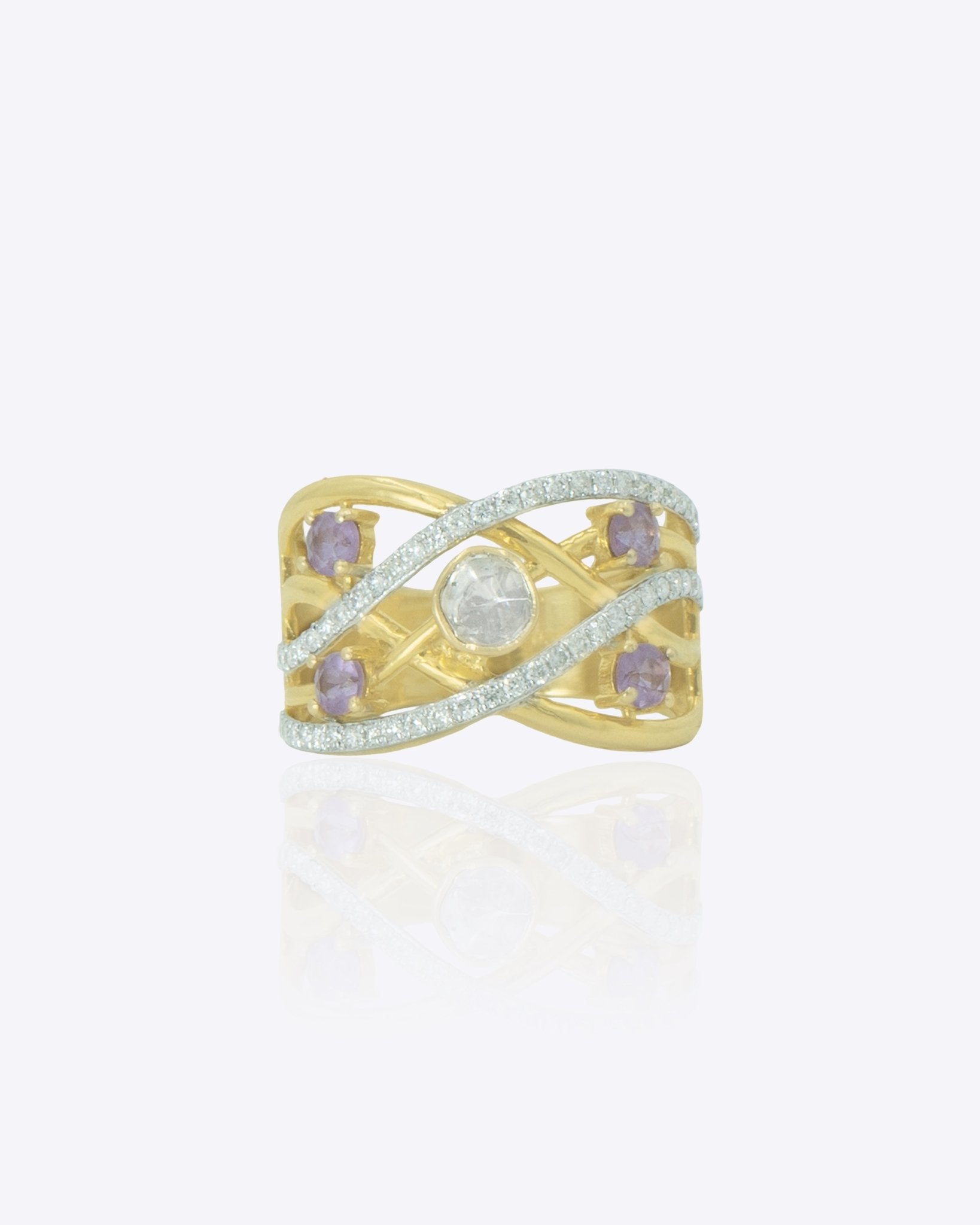 14k gold ring with Polki center and criss-cross line design
