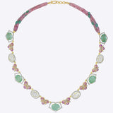 14K gold necklace with emerald accents and a half-butterfly design