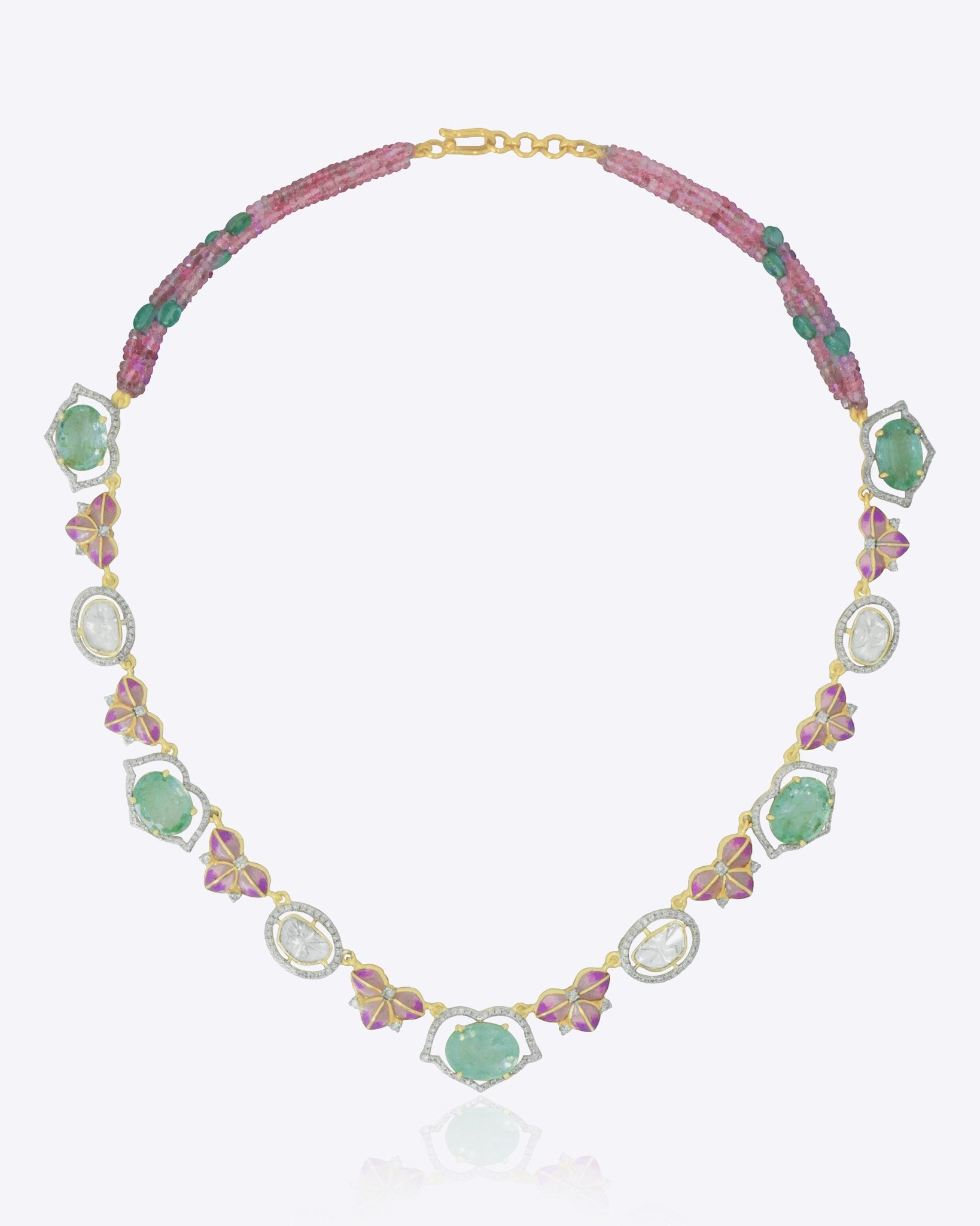 14K gold necklace with emerald accents and a half-butterfly design
