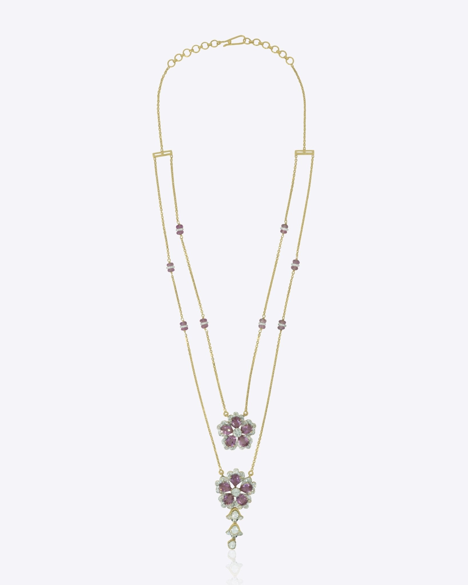 14K gold Petal Pair Necklace with tourmaline and layered floral motifs.