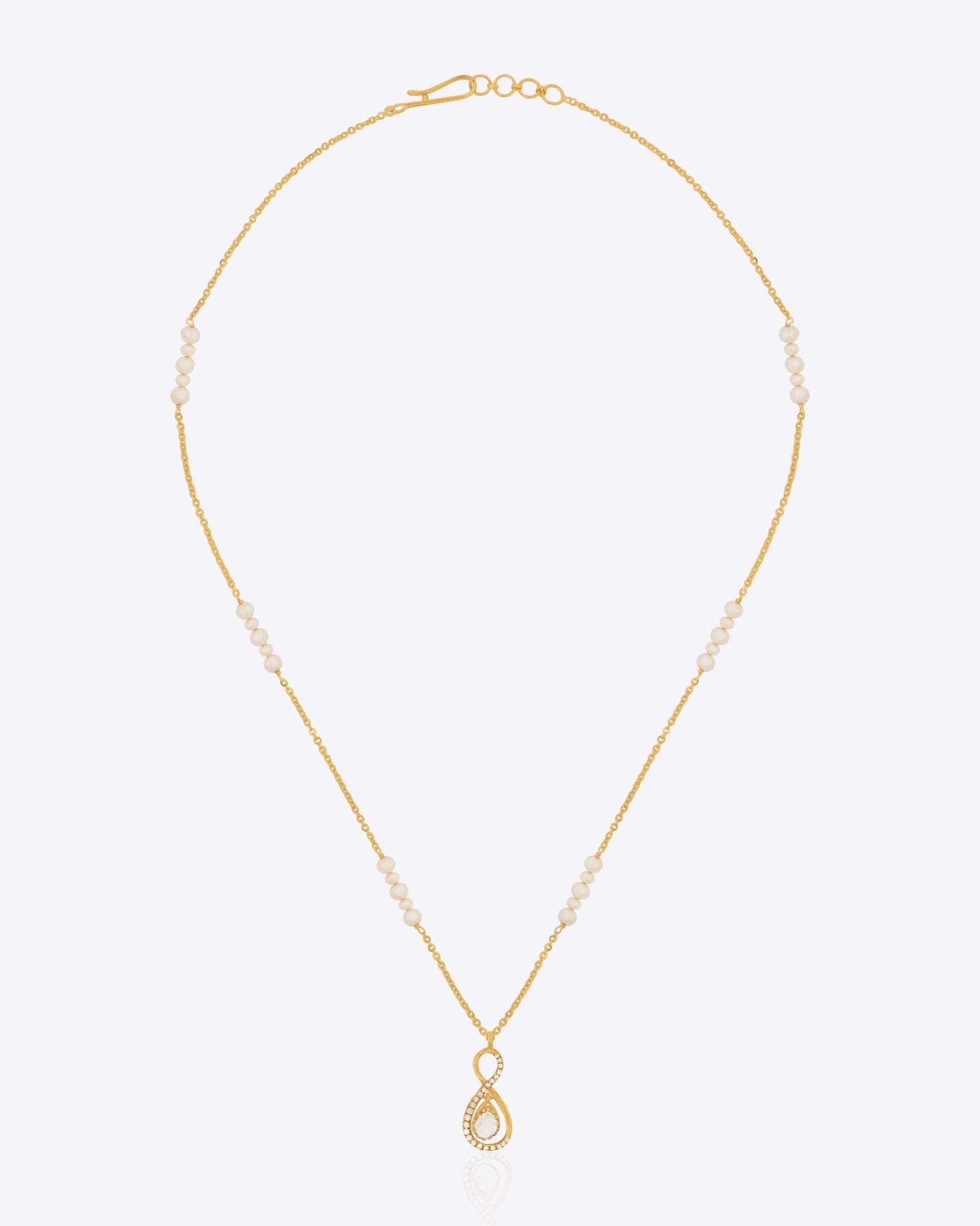 14k gold One & Infinity necklace with Polki and diamonds in an infinity loop.