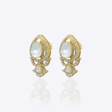 14K gold earrings with Polki and diamond oval layering for festive sparkle.