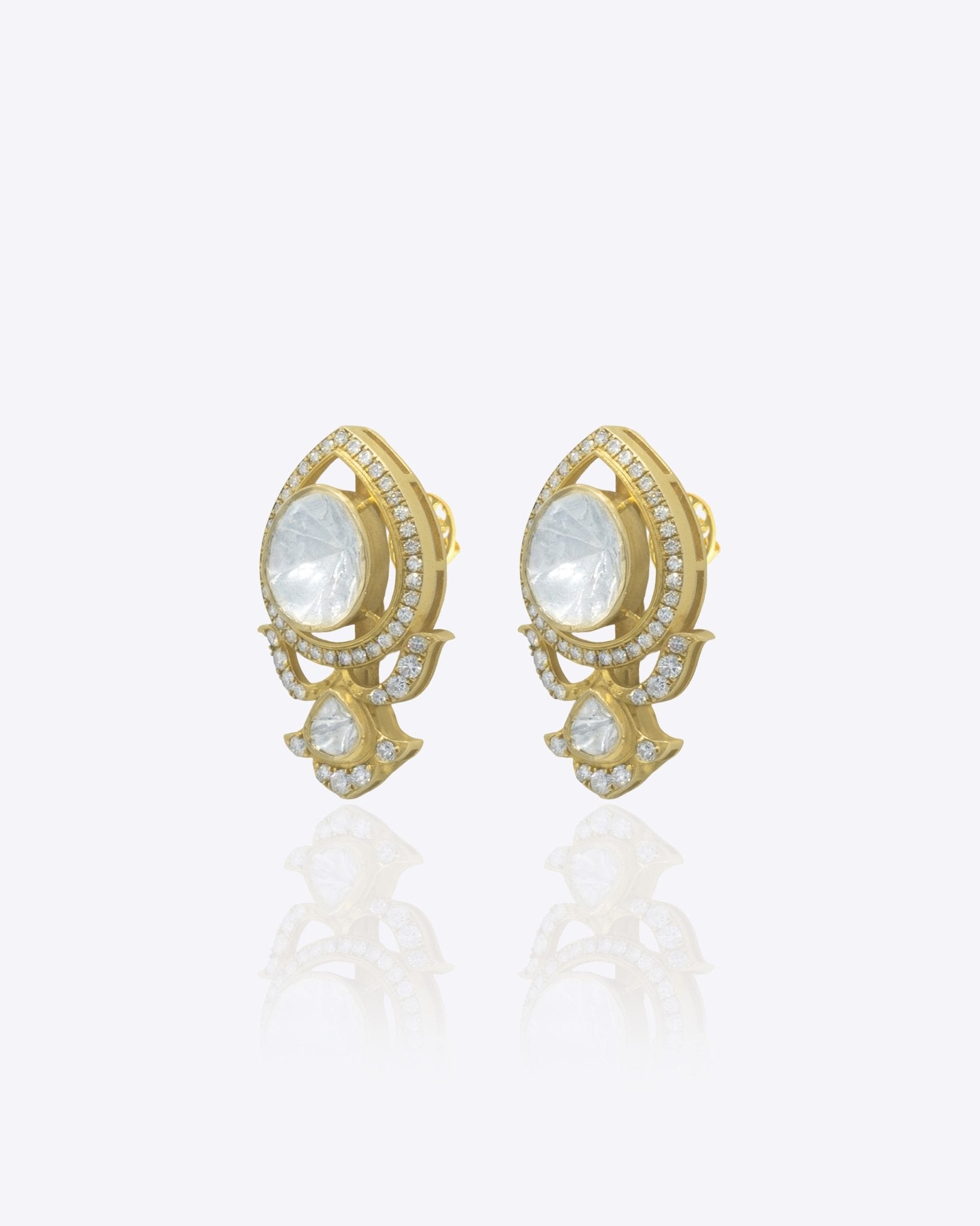 14K gold earrings with Polki and diamond oval layering for festive sparkle.