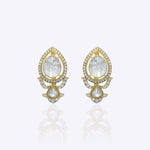 14K gold earrings with Polki and diamond oval layering for festive sparkle.