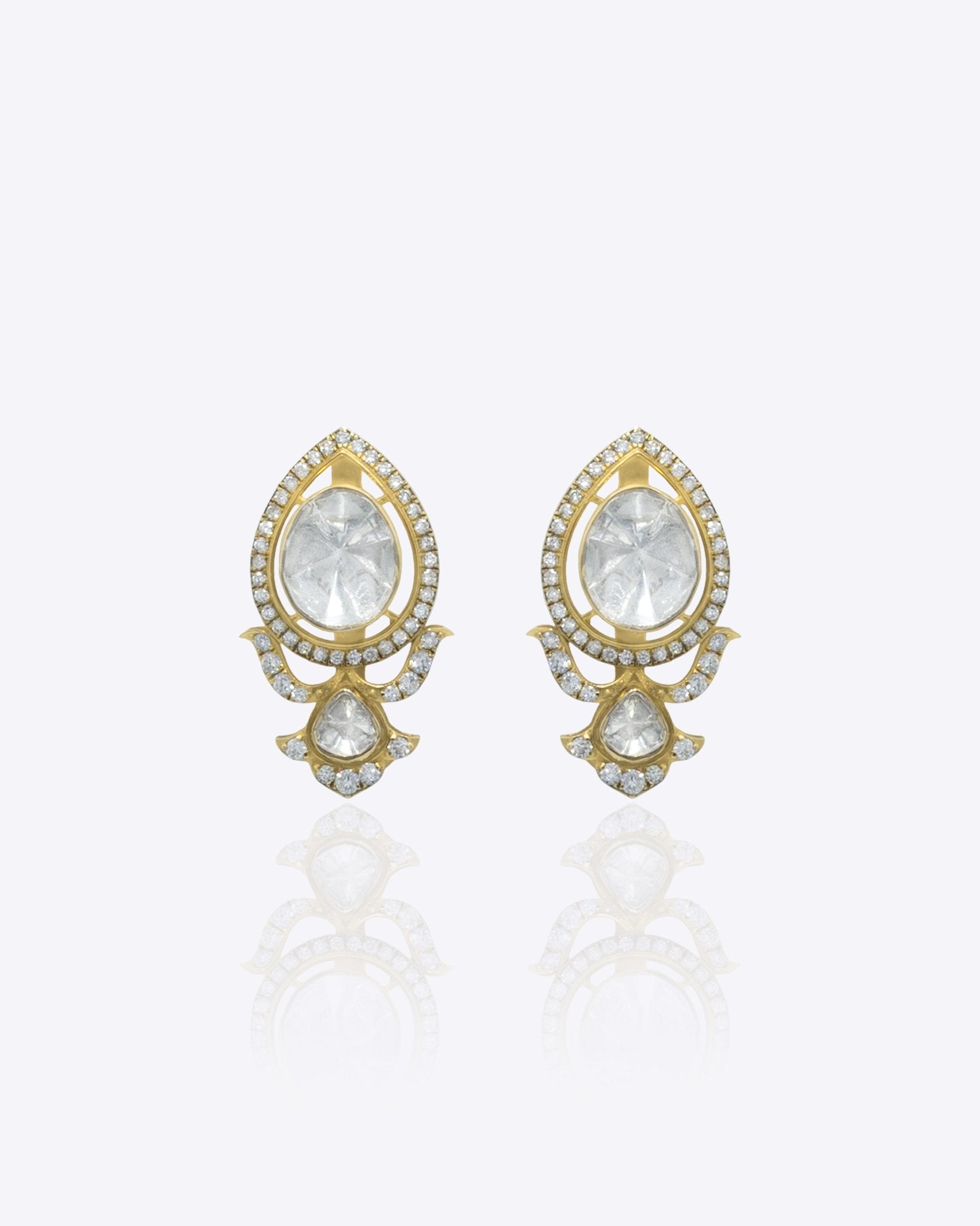 14K gold earrings with Polki and diamond oval layering for festive sparkle.