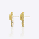 14K gold earrings with Polki and diamond oval layering for festive sparkle.