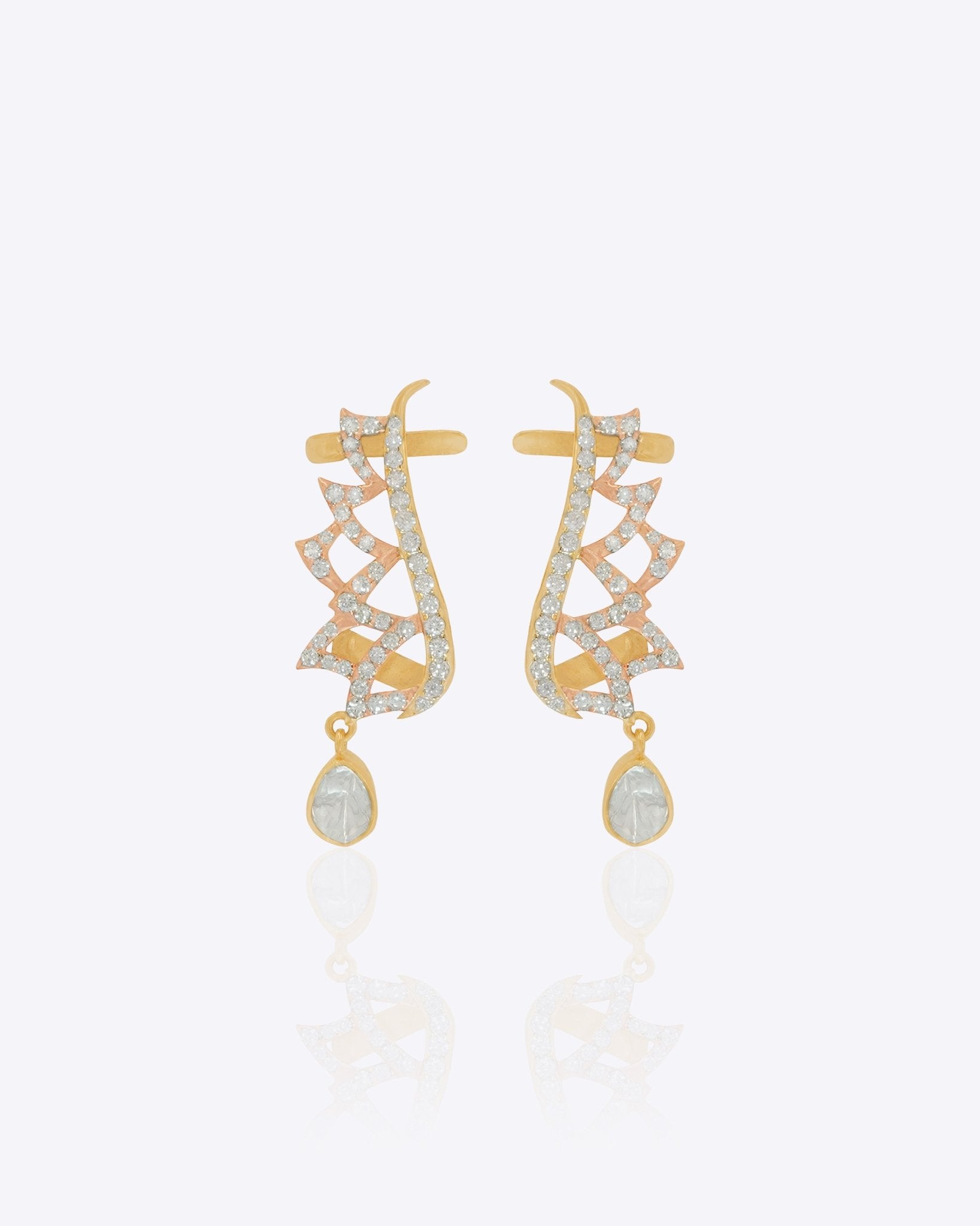 14k gold zig-zag earcuffs with Polki, diamonds, and a spiky silhouette.