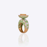 Gold ring with vibrant enamel detailing in a smooth, graceful band.