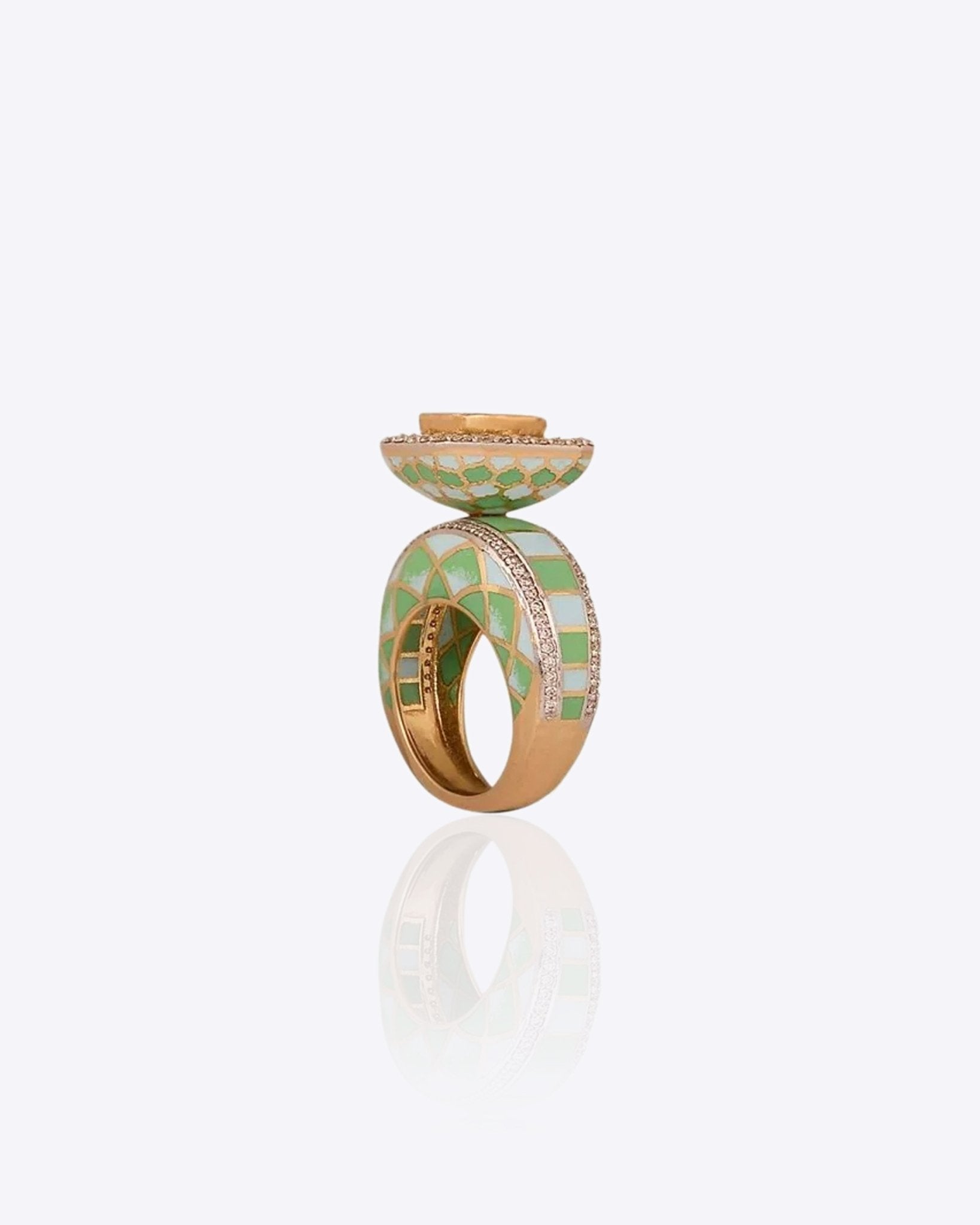 Gold ring with vibrant enamel detailing in a smooth, graceful band.