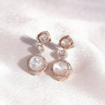 18k gold Noori earrings with Polki diamonds in a constellation-inspired design.
