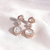 18k gold Noori earrings with Polki diamonds in a constellation-inspired design.