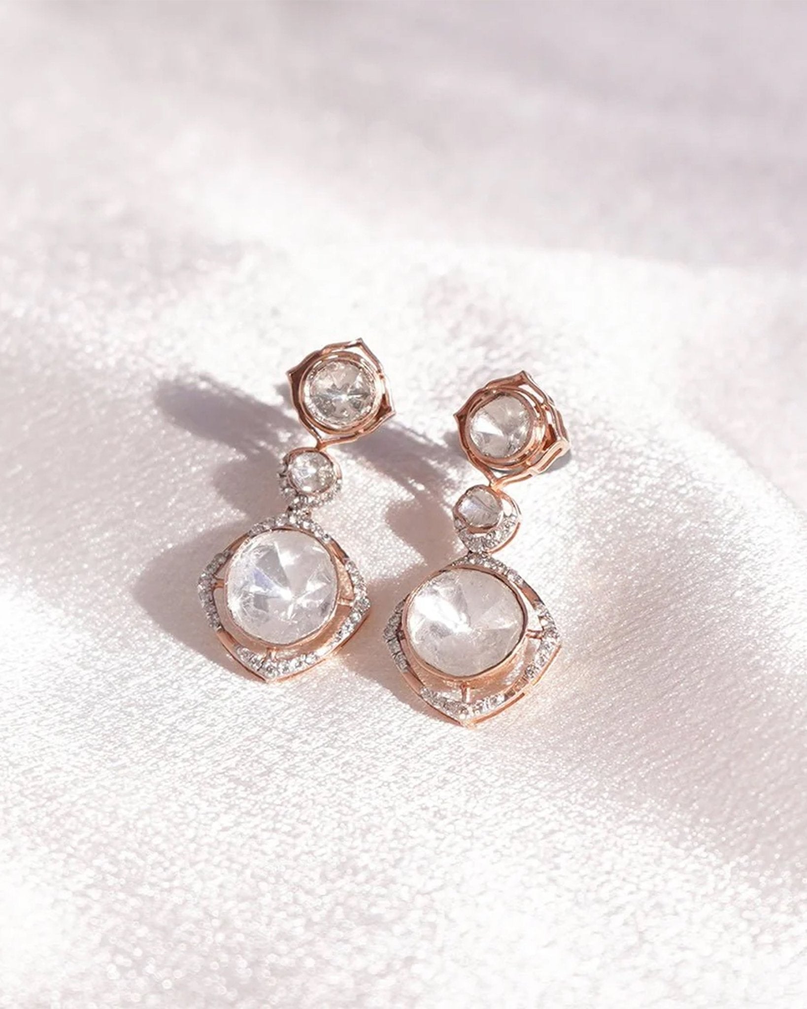 18k gold Noori earrings with Polki diamonds in a constellation-inspired design.