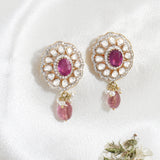18k gold earrings with Polki diamonds, ruby, and tourmaline