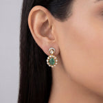 14k gold earrings with emerald studs, diamonds, and Polki drop
