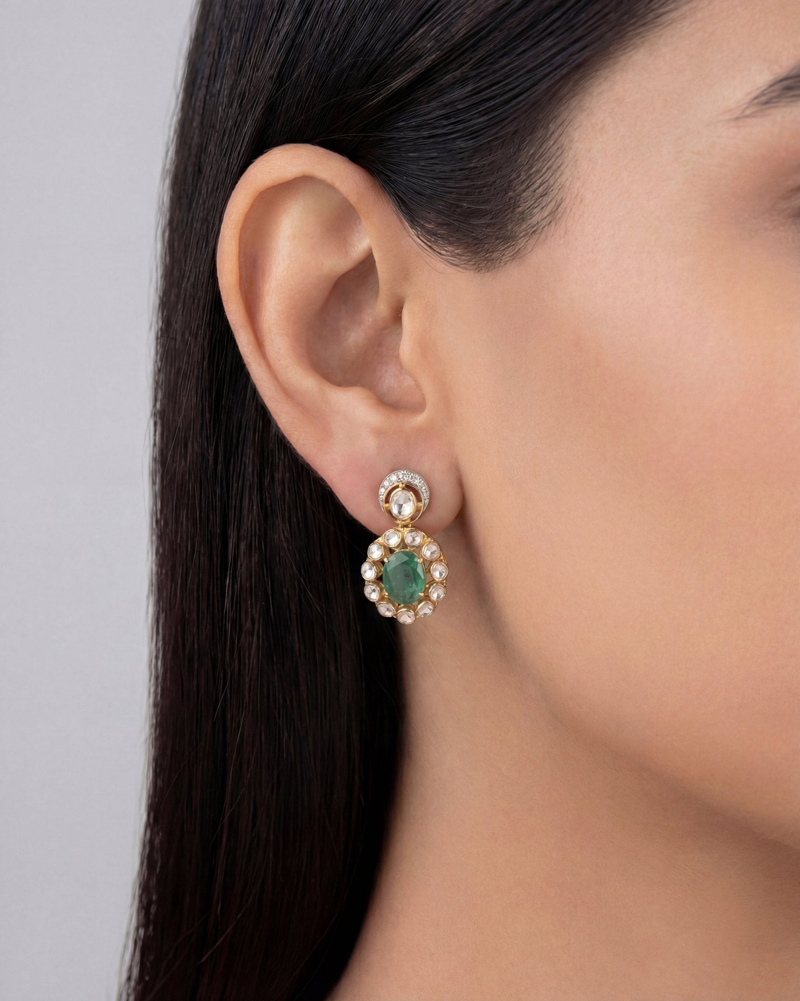 14k gold earrings with emerald studs, diamonds, and Polki drop
