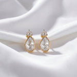 18k gold Polki diamond earrings with a radiant, timeless design.