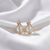 18k gold Polki diamond earrings with a radiant, timeless design.