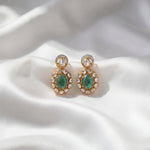 14k gold earrings with emerald studs, diamonds, and Polki drop