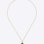 9kt gold pendant with deep blue enamel in a delicate charm shape