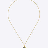 9kt gold pendant with deep blue enamel in a delicate charm shape