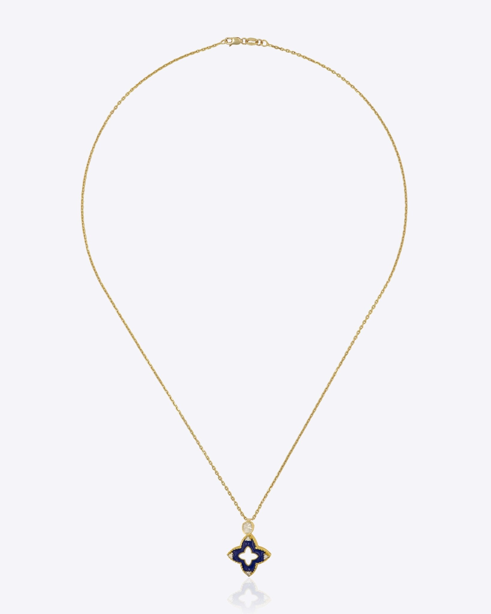 9kt gold pendant with deep blue enamel in a delicate charm shape