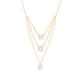 Crafted with finesse, this three-layered pendant features delicate chains adorned with polished links, each graced with a shimmering polki at its center.