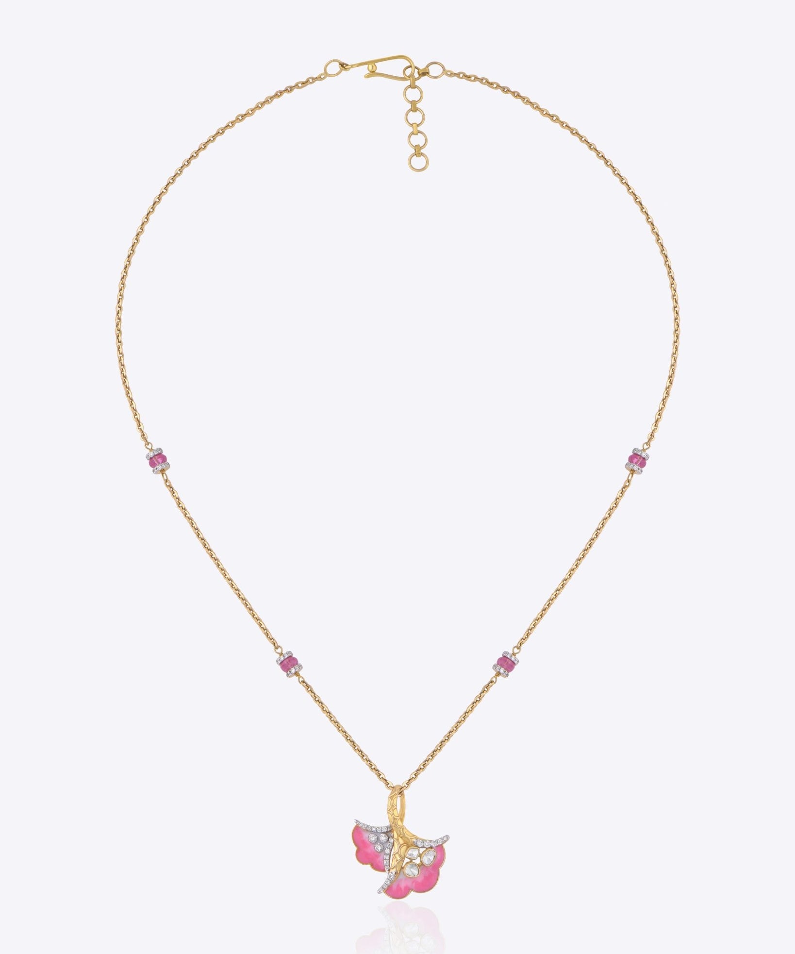 9K gold Blush Petal pendant featuring Polki diamonds and blush pink accents, inspired by nature.