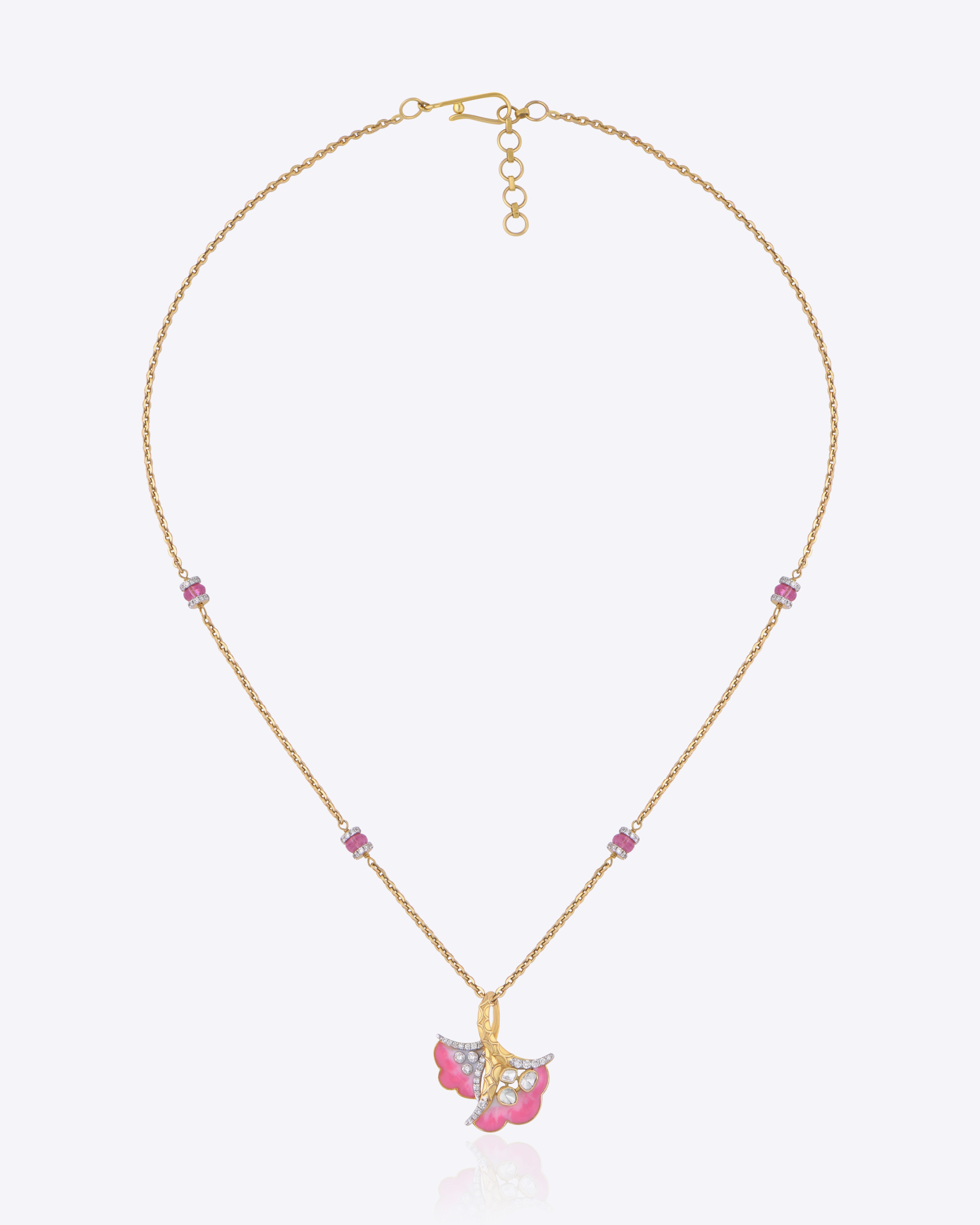 9K gold Blush Petal pendant featuring Polki diamonds and blush pink accents, inspired by nature.