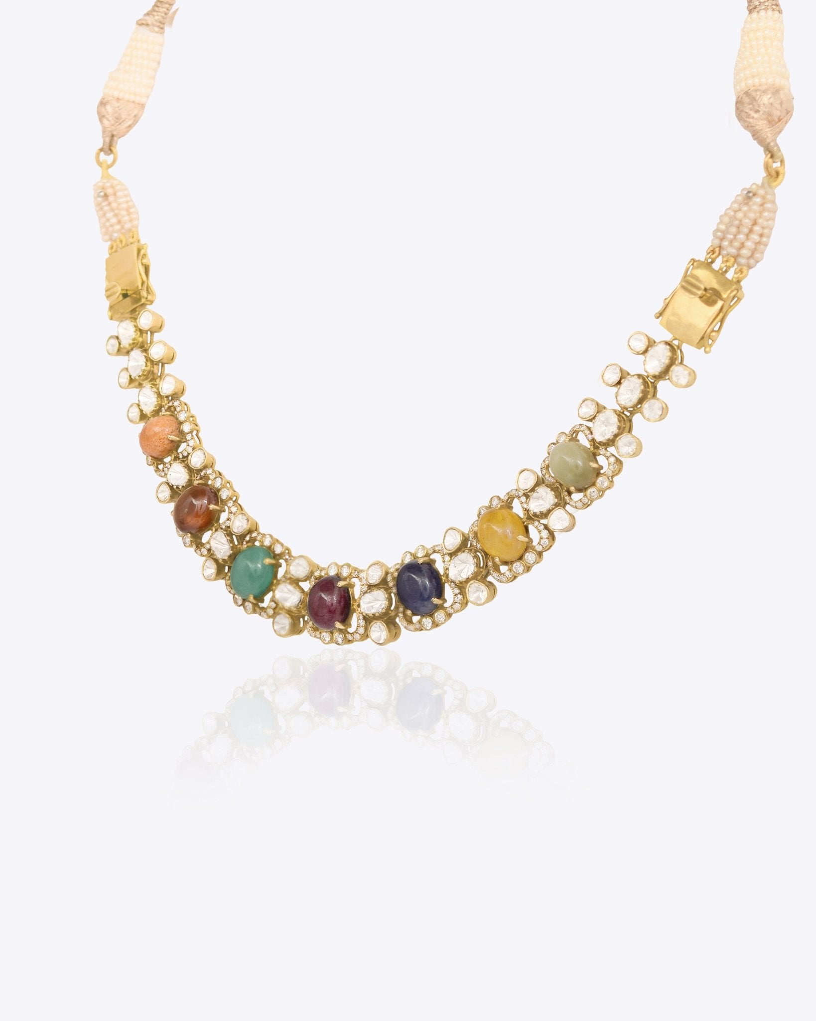 14K gold Navratna Fluttering necklace with vibrant Navratna stones and a Polki border.