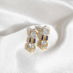 14k gold hexagonal earrings adorned with polkis and talaf stones