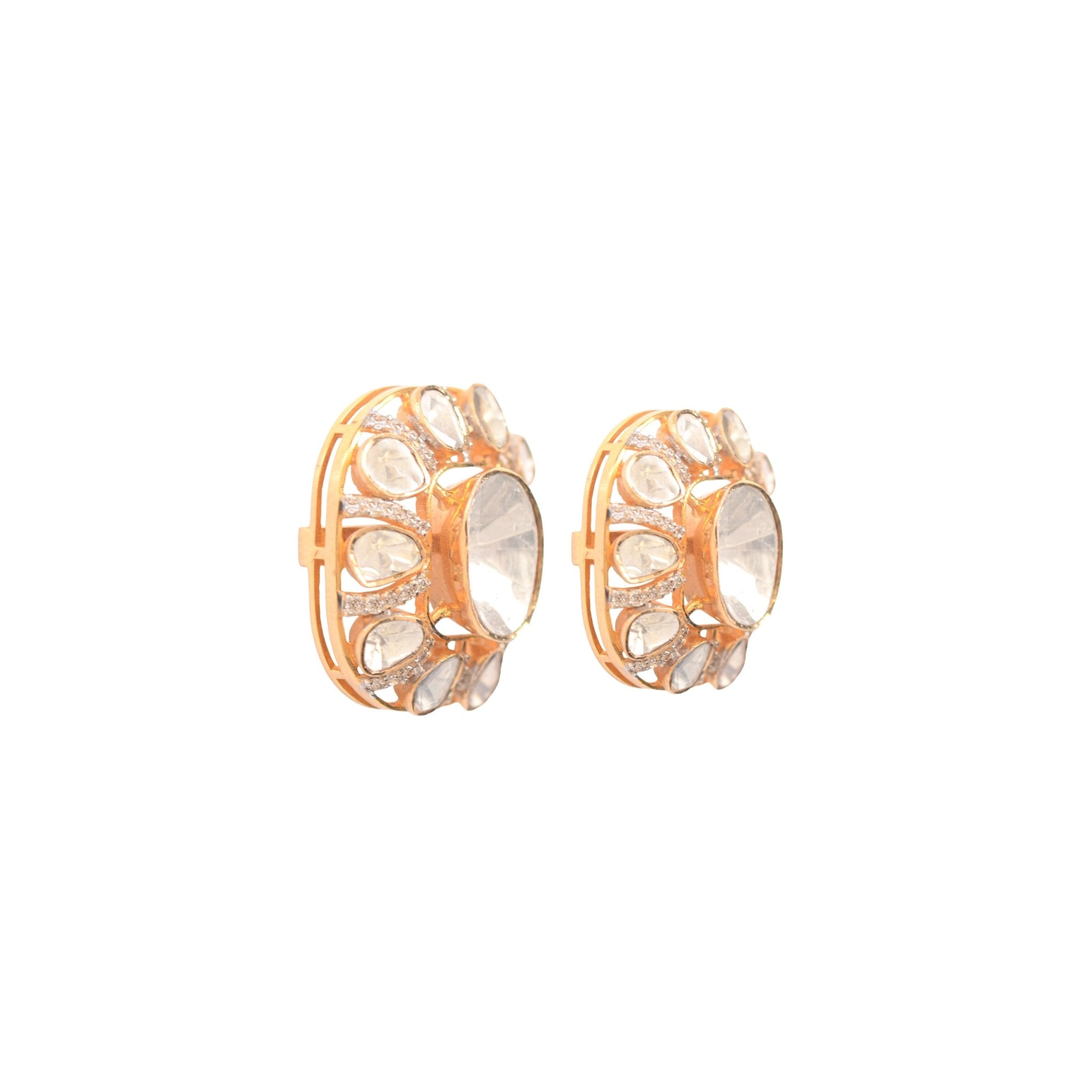 Square-shaped studs with polki diamonds in white and gold.