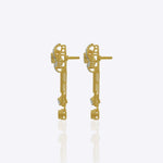 14K gold drop earrings with pear-shaped stones and knot motif